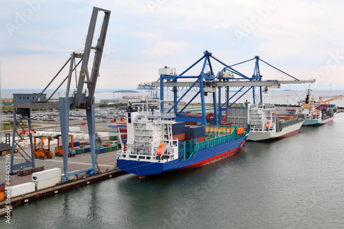Photo: Three big cargo ships in Copenhagen seaport, Denmark Three big cargo ships in Copenhagen seaport, Denmark