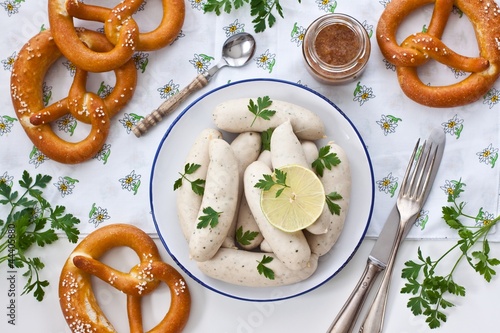 Photo: Munich white sausages with sweet mustard and pretzel Munich white sausages with sweet mustard and pretzel