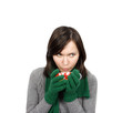 Woman drinking a hot beverage