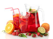 sangria in jar and glasses with fruits, isolated on white