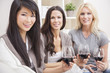 Interracial Group Three Women Friends Drinking Wine