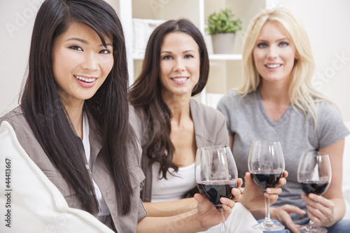 Photo: Interracial Group Three Women Friends Drinking Wine Interracial Group Three Women Friends Drinking Wine
