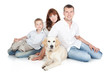 Foto: A young family with a dog A young family with a dog
