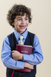 Young Boy Holding a Bible