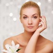 Beautiful woman with lilly flower portrait