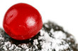 Maraschino cherry on chocolate cake