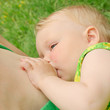 Mother feeding her baby
