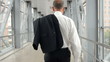 Video: senior businessman going in transit station overpass senior businessman going in transit station overpass