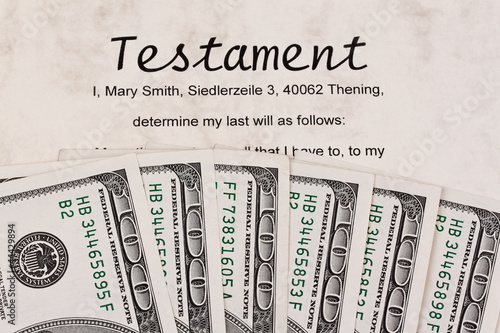 Photo: Dollar Geldscheine und englisches Testament Dollar Geldscheine und englisches Testament