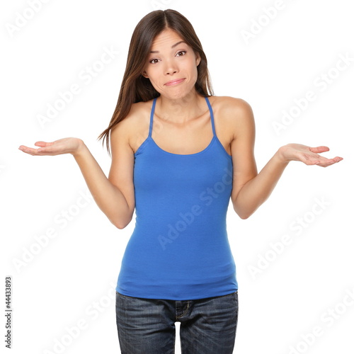 Photo: Shrugging woman in doubt Shrugging woman in doubt