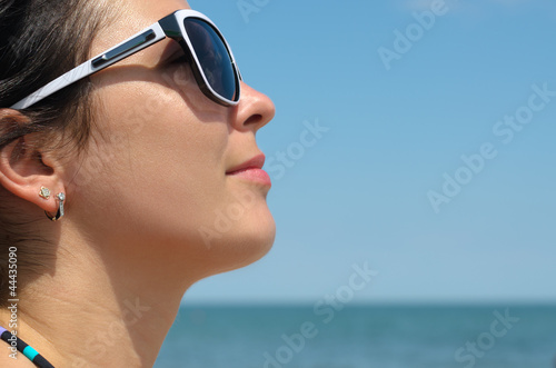 Photo: Woman wearing sunglasses Woman wearing sunglasses