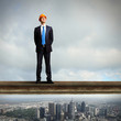 Businessman standing on the construction site
