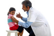 asian doctor with a young girl