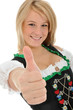 Junge Frau im Dirndl "Daumen rauf"