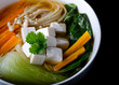 Miso soup with noodles, tofu, enoki and bok choy