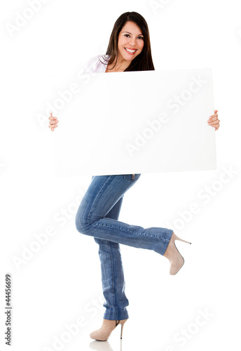 Photo: Excited woman with a banner ad Excited woman with a banner ad