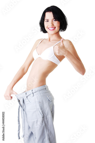 Photo: Young fit woman with big pants Young fit woman with big pants
