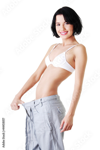 Photo: Young fit woman with big pants Young fit woman with big pants