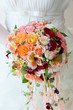 Foto: Bride with bouquet, closeup Bride with bouquet, closeup