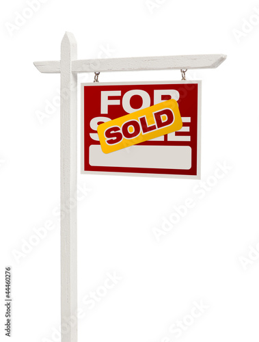 Photo: Red Sold For Sale Real Estate Sign on White Red Sold For Sale Real Estate Sign on White