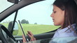Video: Young woman using tablet computer in the car Young woman using tablet computer in the car
