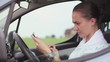 Video: Young woman using tablet computer in the car Young woman using tablet computer in the car