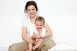 Mother playing with baby