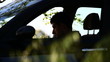 Video: A boy reading in a parked car A boy reading in a parked car