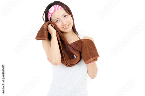 Photo: Young beautiful woman after fitness time. Portrait of asian. Young beautiful woman after fitness time. Portrait of asian.