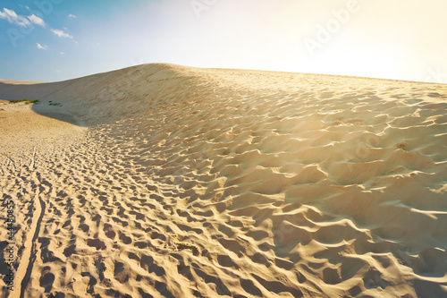 Photo: Shifting dunes at sunset in Leba, Poland Shifting dunes at sunset in Leba, Poland