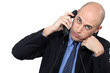 Businessman using two phones