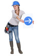 Woman with a one way sign