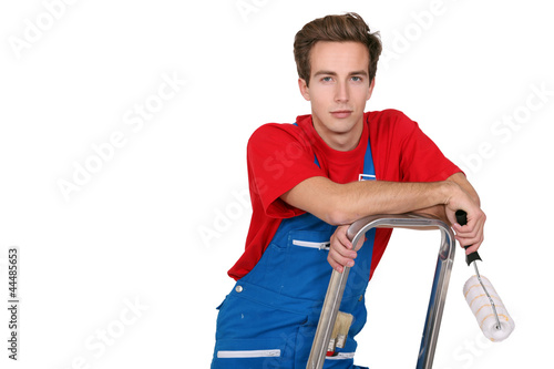 Photo: craftsman painter holding a roller craftsman painter holding a roller