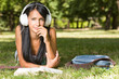 Gorgeous young relaxed student in the park.