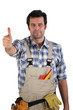 Worker giving the thumbs up