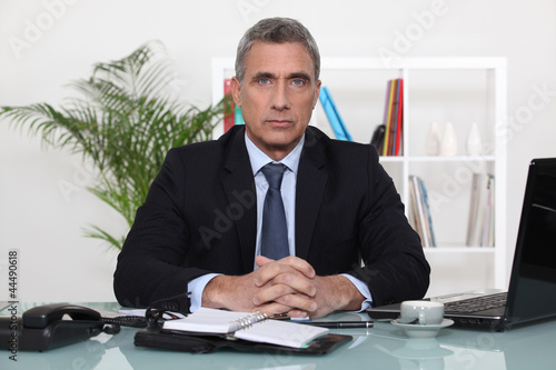Photo: An austere businessman An austere businessman