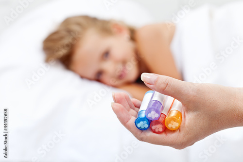 Photo: Little girl awaiting homeopathic medication Little girl awaiting homeopathic medication