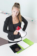 Young adult female holding a bullhorn