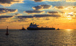 Foto: Solar Convoy - Tanker at sunset putting out to sea. Solar Convoy - Tanker at sunset putting out to sea.