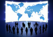 People Stand before World Map On Cinema Screen
