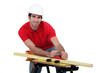 Man planing wood