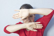 Foto: young girl protecting herself young girl protecting herself