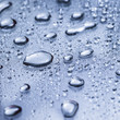 Water drops on a blue surface