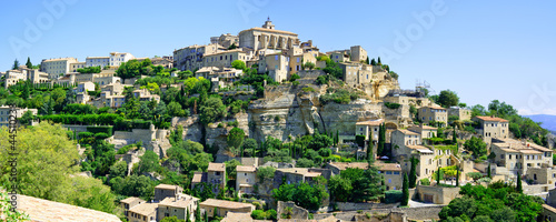 Photo: Gordes Medieval Village on rock hill panorama. Luberon, Provence Gordes Medieval Village on rock hill panorama. Luberon, Provence