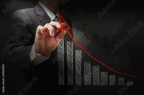 Photo: businessman hand touch virtual graph,chart businessman hand touch virtual graph,chart