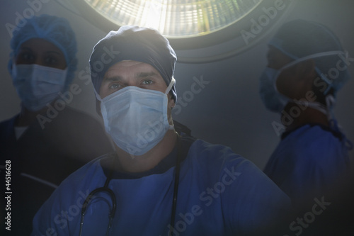 Photo: Portrait of confident surgeons in operating room Portrait of confident surgeons in operating room