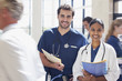 Portrait of smiling doctor and nurse in hospital
