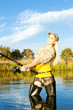 woman fishing in pond