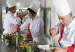 Foto: group of young beautiful professional chefs group of young beautiful professional chefs