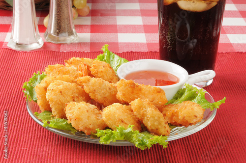 Photo: Coconut shrimp and a soft drink Coconut shrimp and a soft drink